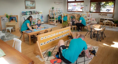 The Village Early Education Team Supporting Child Learning In Our Centre